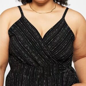 Kaileigh size 3X. Knit crop jumpsuit. black with gold/silver design. Never worn.